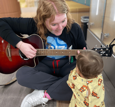music-therapy-sarra-erb-guitar-with-baby_400x372_v3