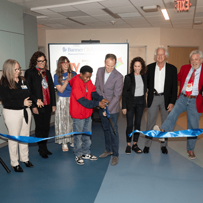 playzone-ribbon-cutting_400x372